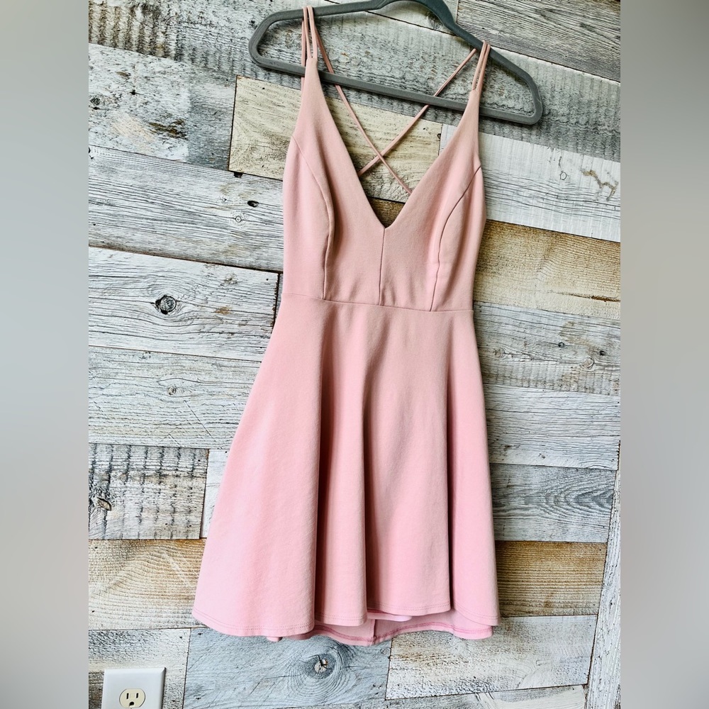 Lulu’s blush-pink strappy-back skater mini dress